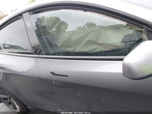 Auction sale of the 2025 Tesla Model Y Long Range Dual Motor All-wheel Drive, vin: 7SAYGAEE9SF248618, lot number: 45373899
