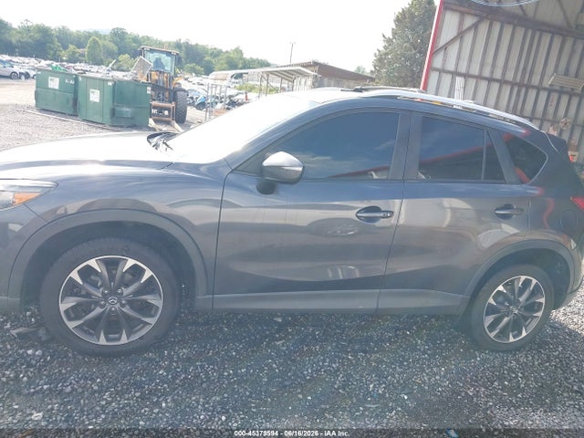 2016 Mazda Cx-5 Grand Touring მანქანა იყიდება აუქციონზე, vin: JM3KE4DY7G0799455, აუქციონის ნომერი: 45379594