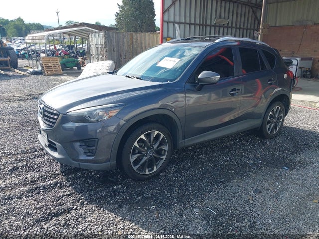2016 Mazda Cx-5 Grand Touring მანქანა იყიდება აუქციონზე, vin: JM3KE4DY7G0799455, აუქციონის ნომერი: 45379594