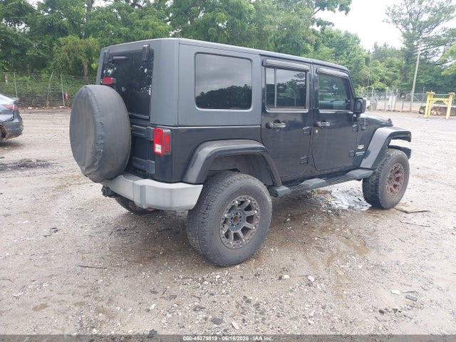 2007 Jeep Wrangler Unlimited Sahara მანქანა იყიდება აუქციონზე, vin: 1J4GB59177L150305, აუქციონის ნომერი: 45379819