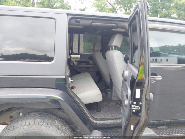 2007 Jeep Wrangler Unlimited Sahara მანქანა იყიდება აუქციონზე, vin: 1J4GB59177L150305, აუქციონის ნომერი: 45379819