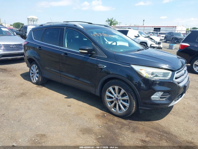 Auction sale of the 2017 Ford Escape Titanium, vin: 1FMCU9JD1HUD63477, lot number: 45380161