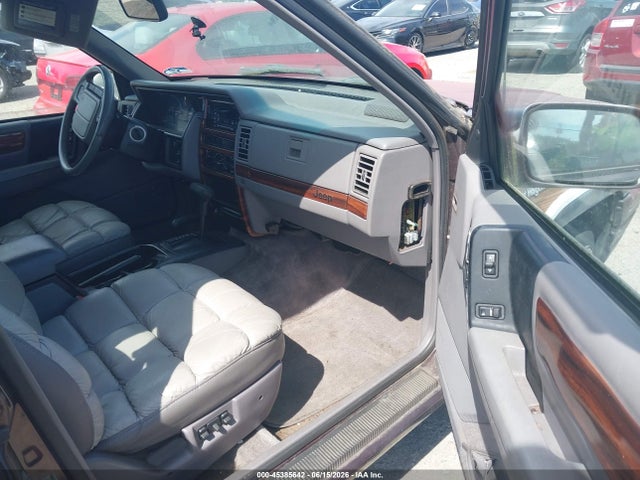 45385642 :رقم المزاد ، 1J4GZ88Y7PC567208 vin ، 1993 Jeep Grand Cherokee Sport مزاد بيع
