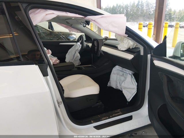 Продаж на аукціоні авто 2023 Tesla Model Y Awd/long Range Dual Motor All-wheel Drive, vin: 7SAYGAEE4PF827006, номер лоту: 45389126