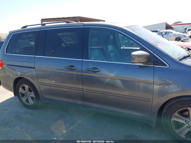 2010 Honda Odyssey Touring მანქანა იყიდება აუქციონზე, vin: 5FNRL3H92AB063946, აუქციონის ნომერი: 45401236