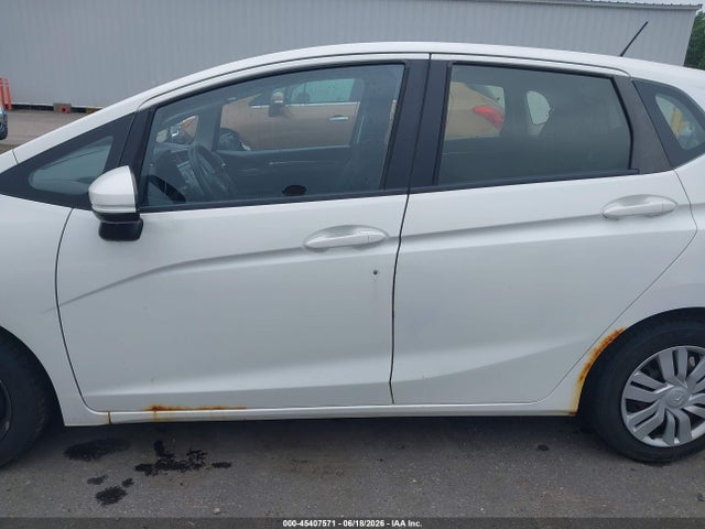 JHMGK5H57GX014144 Honda FIT LX