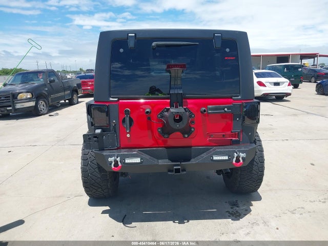 1C4HJWDG0EL295245 Jeep Wrangler Unlimited Sport
