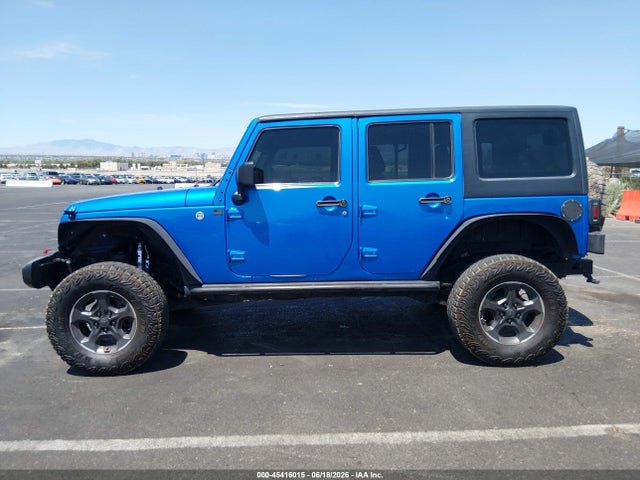 1C4BJWDG3GL125812 Jeep Wrangler Unlimited Black Bear
