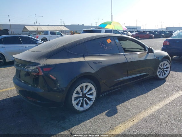 Tesla Model 3 Standard Range Plus Rear-wheel Drive 2021 5YJ3E1EA9MF861402 Image 4