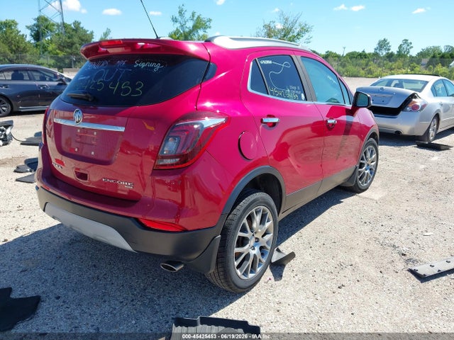45425453 :رقم المزاد ، KL4CJ2SB4JB519122 vin ، 2018 Buick Encore Sport Touring مزاد بيع