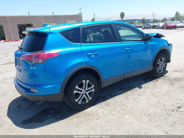 Toyota RAV4 LE 2018 2T3ZFREV3JW440306 Image 4