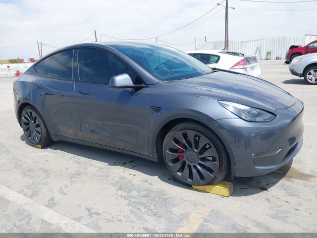 Tesla Model Y Performance Dual Motor All-wheel Drive 2023 7SAYGDEF6PF643793 головне зображення