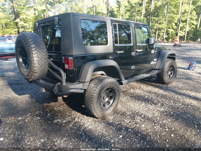 Auction sale of the 2007 Jeep Wrangler Unlimited Sahara, vin: 1J4GA59117L118243, lot number: 45451942