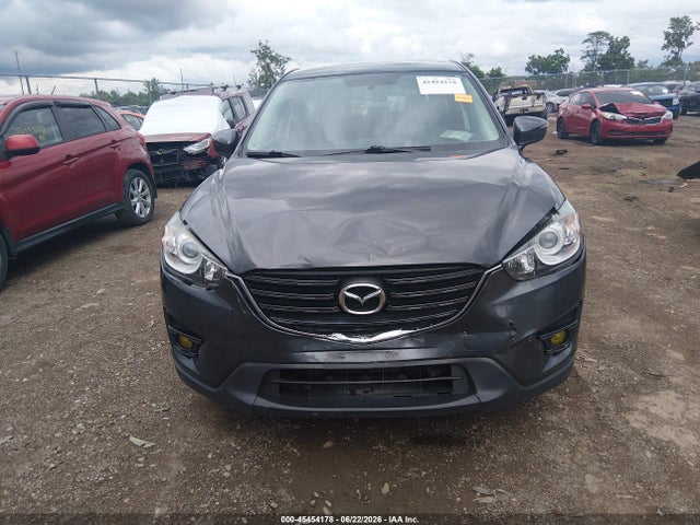 2016 Mazda Cx-5 Touring მანქანა იყიდება აუქციონზე, vin: JM3KE4CY9G0810523, აუქციონის ნომერი: 45454178