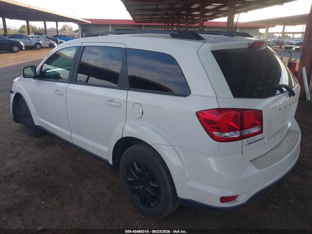 3C4PDCBB9KT867082 Dodge JOURNEY SE