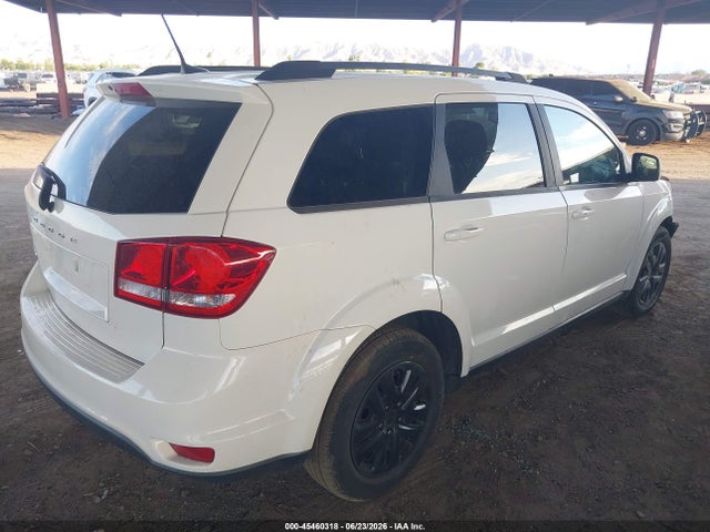 3C4PDCBB9KT867082 Dodge JOURNEY SE
