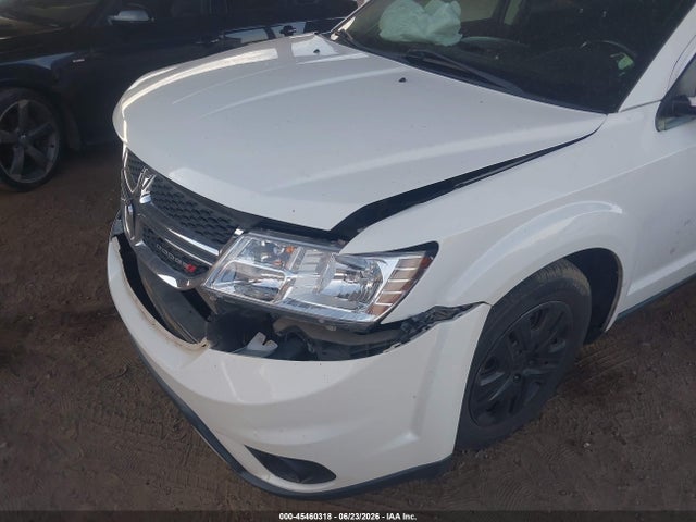 3C4PDCBB9KT867082 Dodge JOURNEY SE