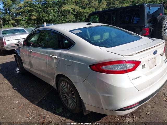 Auction sale of the 2014 Ford Fusion Hybrid Titanium, vin: 3FA6P0RU1ER351010, lot number: 45465120