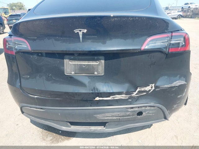 2025 Tesla Model Y Long Range Dual Motor Rear-wheel Drive მანქანა იყიდება აუქციონზე, vin: 7SAYGDED4SF313044, აუქციონის ნომერი: 45472204