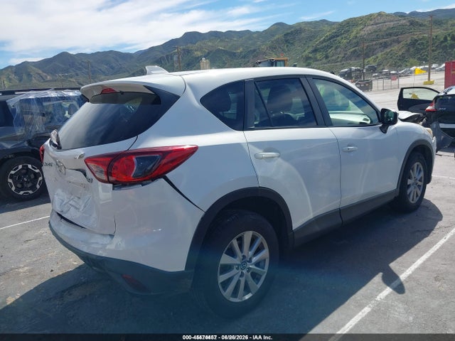 2015 Mazda Cx-5 Touring მანქანა იყიდება აუქციონზე, vin: JM3KE2CY3F0551532, აუქციონის ნომერი: 45474457
