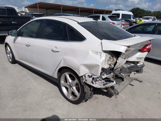 Продажа на аукционе авто 2014 Ford Focus Titanium, vin: 1FADP3J27EL390394, номер лота: 45479381