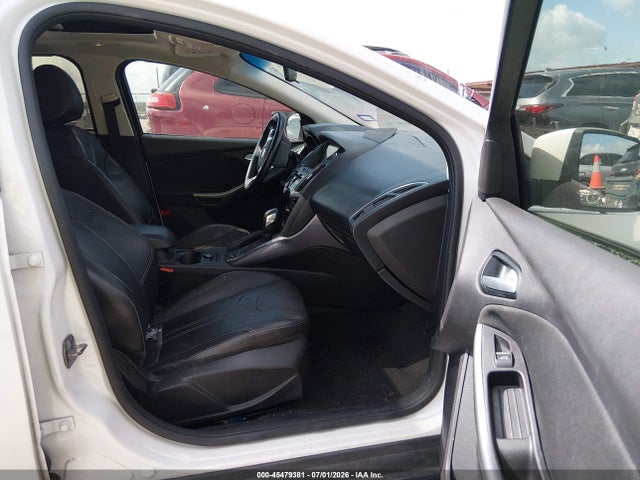 Продажа на аукционе авто 2014 Ford Focus Titanium, vin: 1FADP3J27EL390394, номер лота: 45479381
