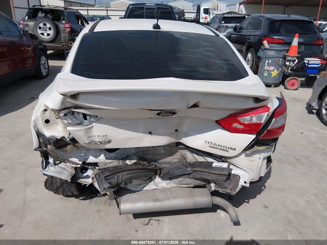 Продажа на аукционе авто 2014 Ford Focus Titanium, vin: 1FADP3J27EL390394, номер лота: 45479381