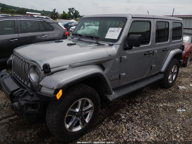 1C4HJXEN9JW261199 Jeep Wrangler Unlimited Sahara 4x4