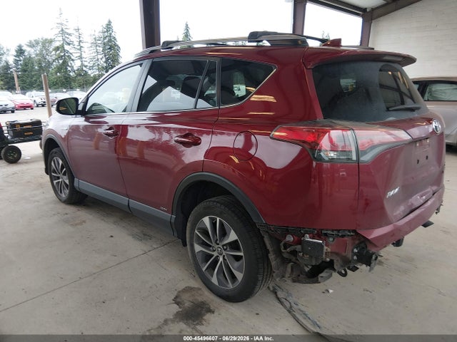 JTMRJREV8JD238556 Toyota Rav4 Hybrid Xle