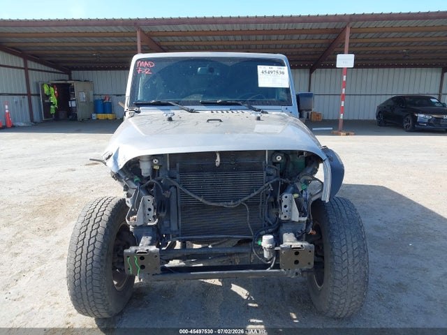1C4BJWDG5GL179547 Jeep Wrangler Unlimited Sport