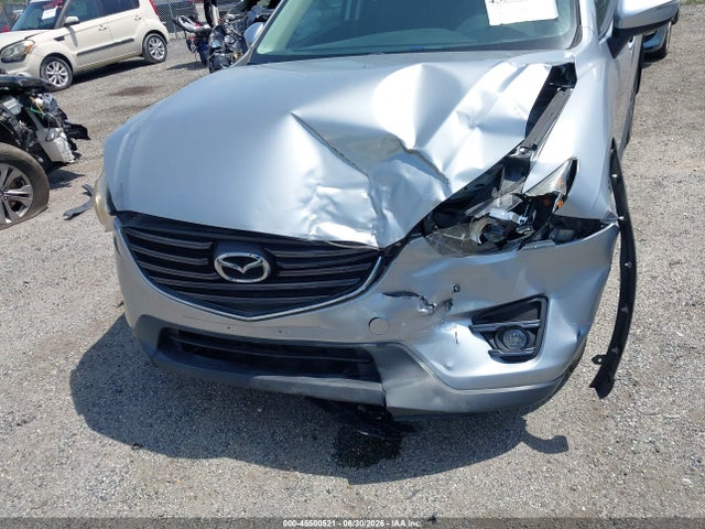 2016 Mazda Cx-5 Touring მანქანა იყიდება აუქციონზე, vin: JM3KE4CY2G0805440, აუქციონის ნომერი: 45500521
