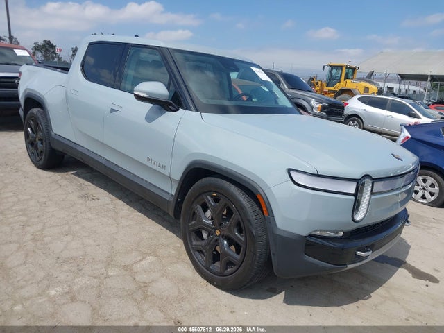 Rivian R1t Adventure/adventure Dual Motor Large Pack/adventure Dual Motor Max Pack 2023 7FCTGBAA7PN029398 головне зображення