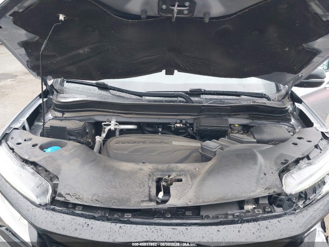 5FNYF8H0XKB002573 Honda Passport Elite