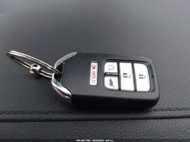 5FNYF8H0XKB002573 Honda Passport Elite