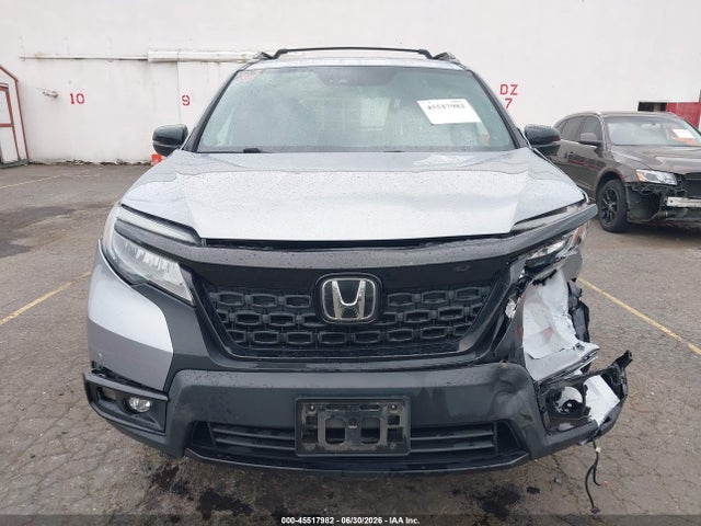 5FNYF8H0XKB002573 Honda Passport Elite