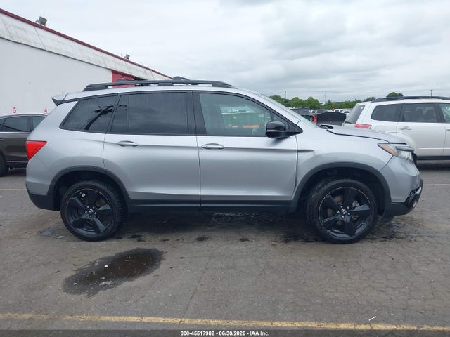 5FNYF8H0XKB002573 Honda Passport Elite