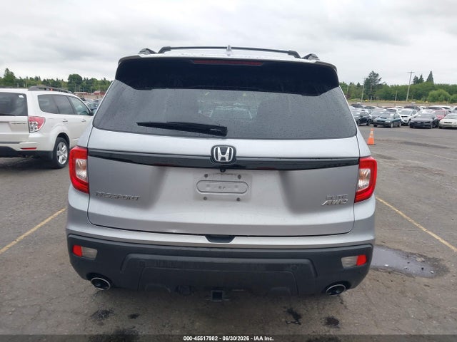 5FNYF8H0XKB002573 Honda Passport Elite