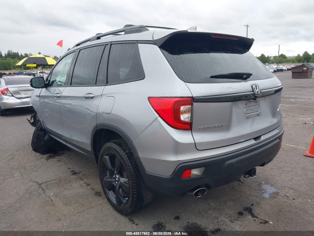 5FNYF8H0XKB002573 Honda Passport Elite
