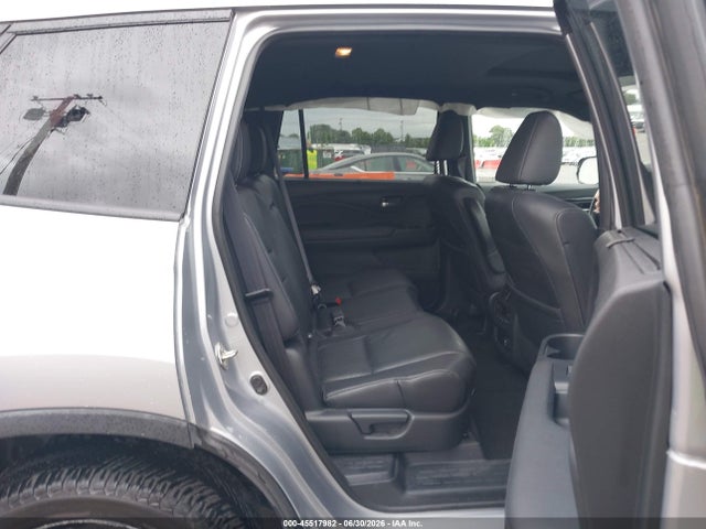 5FNYF8H0XKB002573 Honda Passport Elite