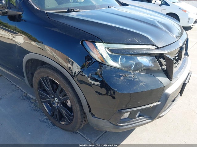 5FNYF7H20KB009236 Honda Passport Sport