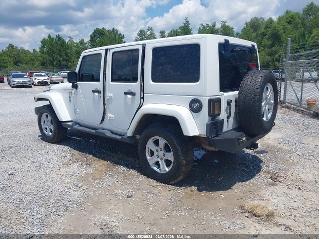1C4HJWEG2EL123801 Jeep Wrangler Unlimited Sahara