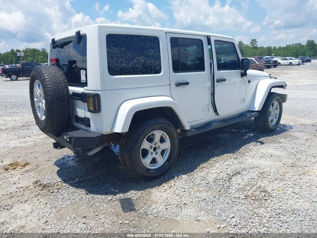 1C4HJWEG2EL123801 Jeep Wrangler Unlimited Sahara