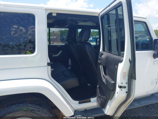 1C4HJWEG2EL123801 Jeep Wrangler Unlimited Sahara