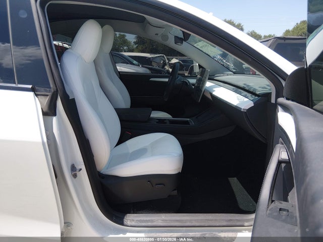 Продаж на аукціоні авто 2023 Tesla Model Y Awd/long Range Dual Motor All-wheel Drive, vin: 7SAYGDEE8PA147155, номер лоту: 45520995