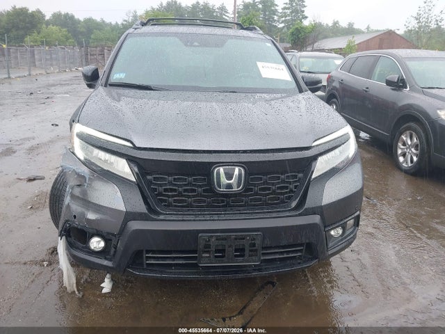 5FNYF8H02KB004642 Honda Passport Elite