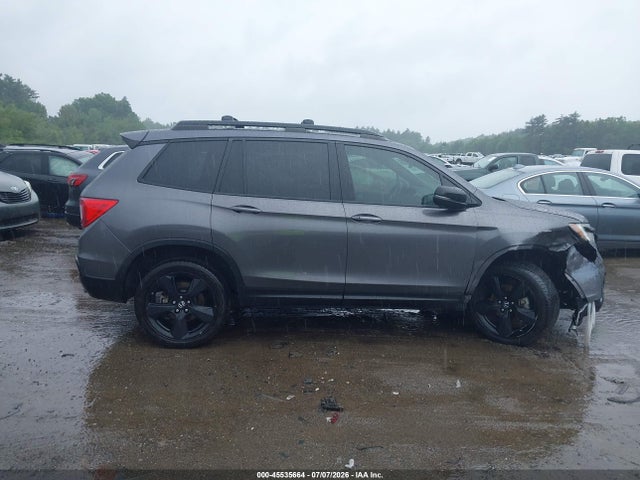 5FNYF8H02KB004642 Honda Passport Elite