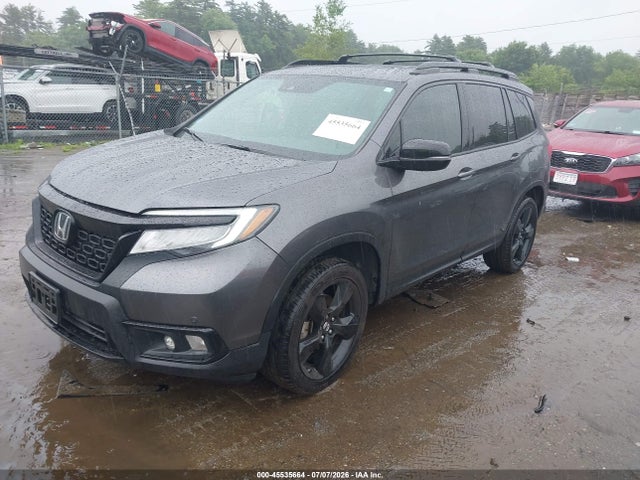 5FNYF8H02KB004642 Honda Passport Elite