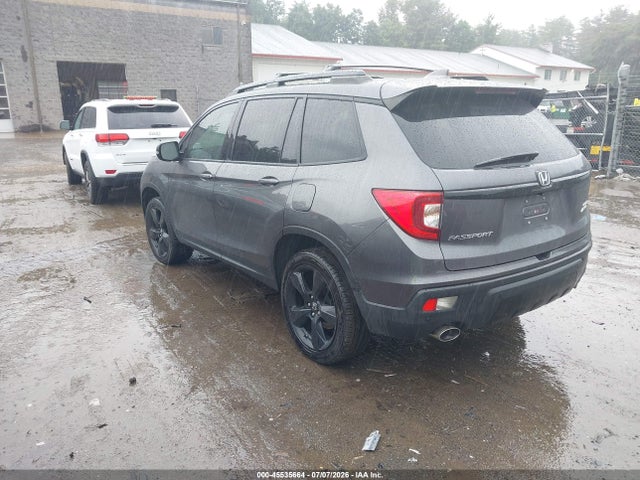 5FNYF8H02KB004642 Honda Passport Elite