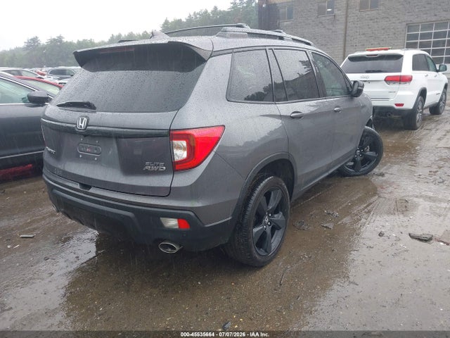 5FNYF8H02KB004642 Honda Passport Elite