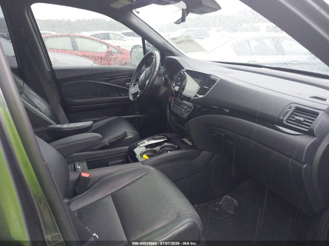 5FNYF8H02KB004642 Honda Passport Elite